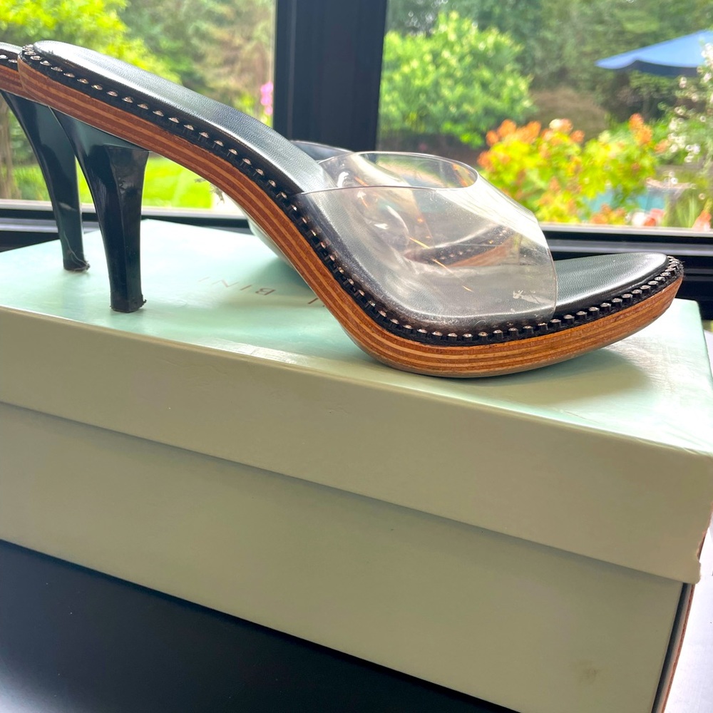 Clear pump with wood heel with rhinestones. Super cute and comfortable. Has box.